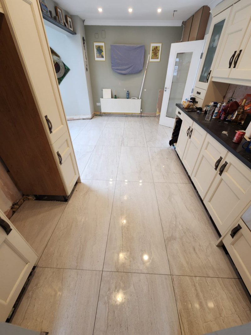 Large marble tile flooring in kitchen – view from stove and sink, RC Tiling Dublin