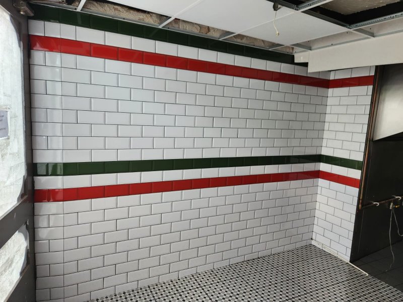 Hallway with Victorian stone tile flooring and ceramic wall tiles in brick pattern – RC Tiling Dublin