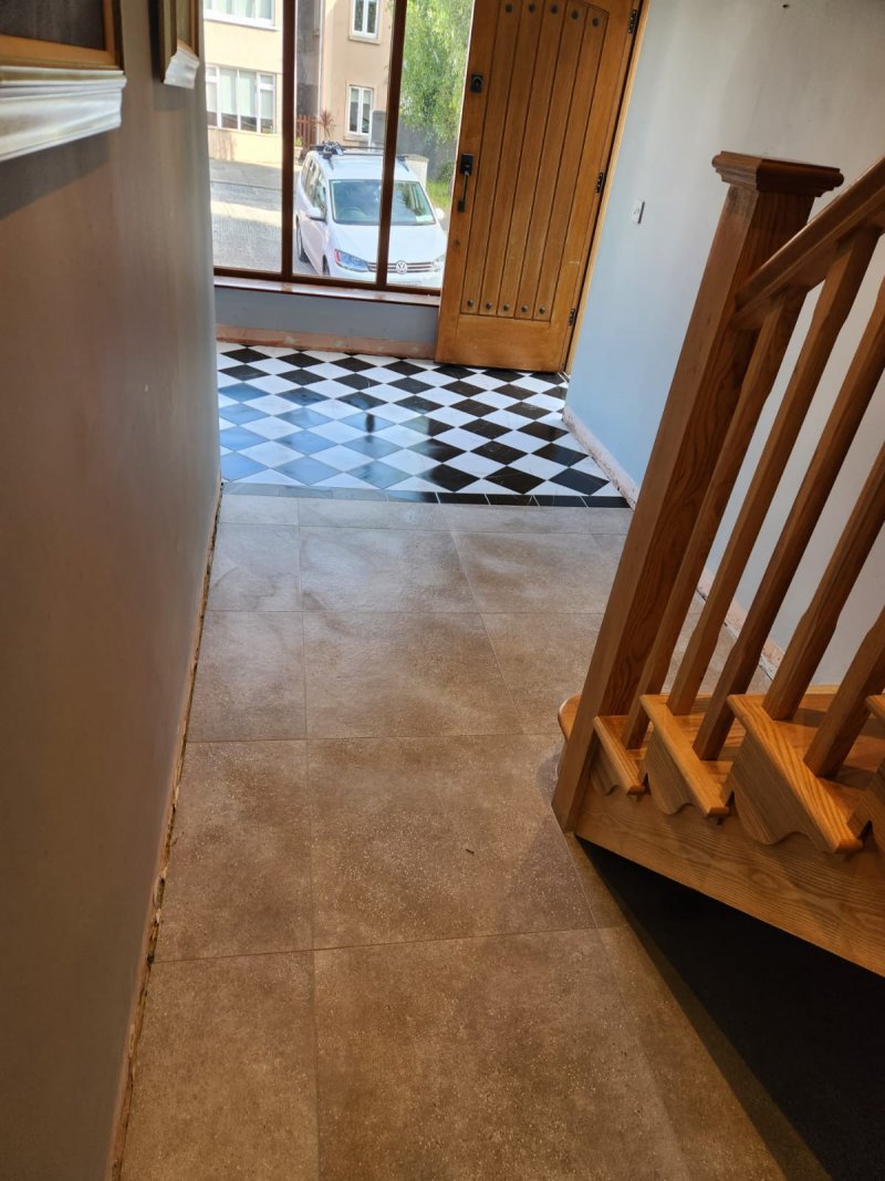Diagonal view of ceramic tile flooring and wooden staircase – RC Tiling Dublin  
