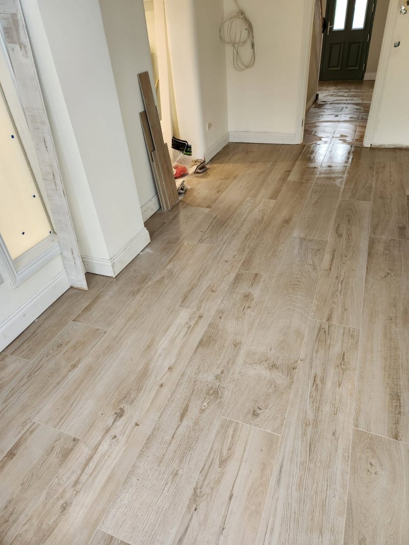 Extended view of wood-look tile flooring in residential interior – RC Tiling Dublin