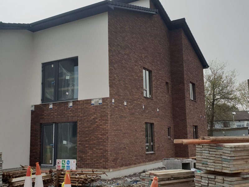 Exterior balcony construction site with materials and safety setup – RC Tiling Dublin