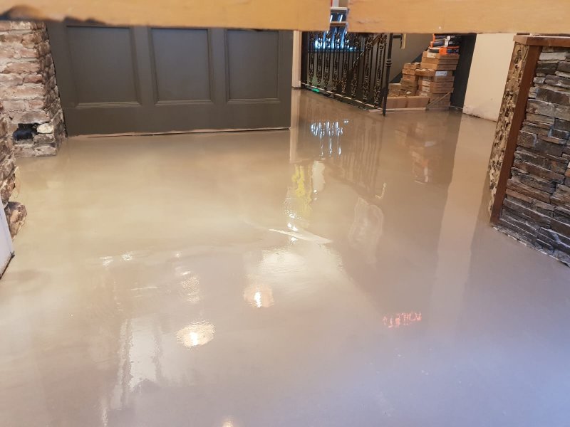 Professional self-leveling floor screed application for a commercial bar renovation in Dublin.