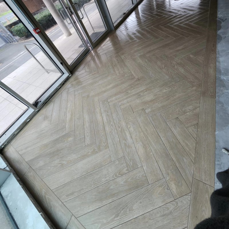Entry view of herringbone parquet and ceramic tile flooring – RC Tiling Dublin